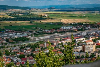 a view of a small town from a hill